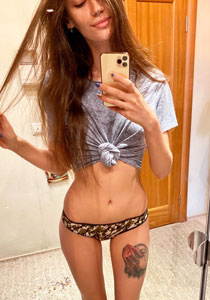 skinny girl taking selfie in bathroom for snap
